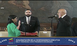 Rodríguez'in yemin törenini Ulusal Meclis Başkanı olan erkek kardeşi gerçekleştirdi