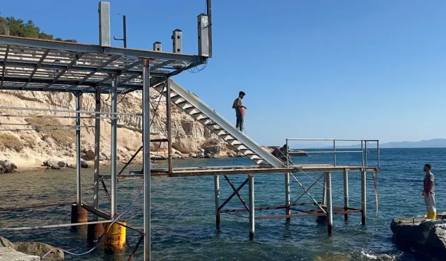 Ayıbalığı Koyu'ndaki izinsiz iskelenin sökümü başladı